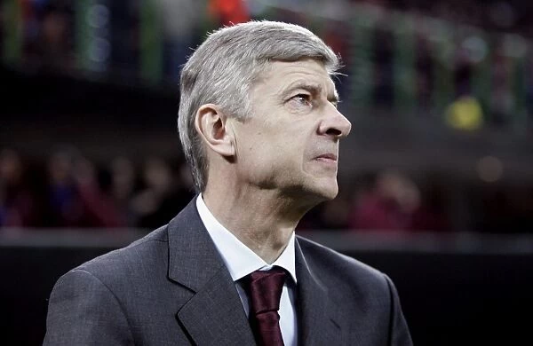 Arsene Wenger Leads Arsenal to Victory: 2-0 Over AC Milan in Champions League