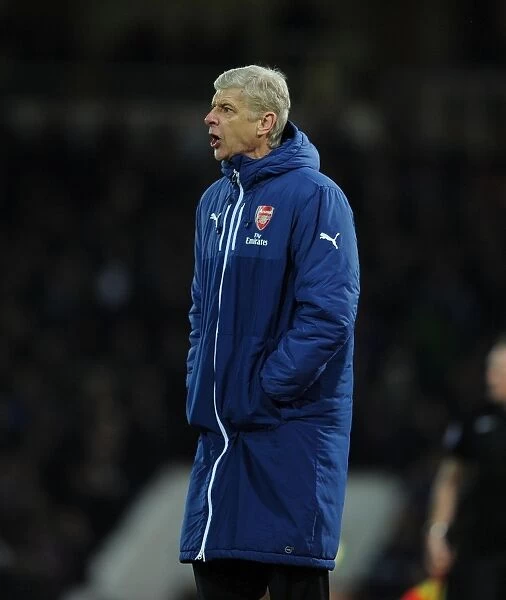 Arsene Wenger Leads Arsenal Against West Ham United in Premier League (2014-15)