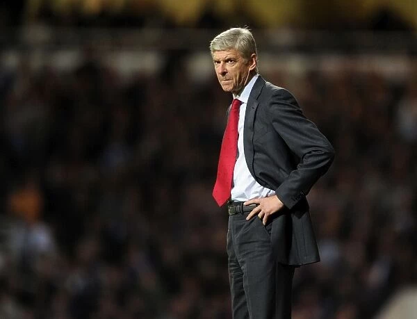 Arsene Wenger Leads Arsenal Against West Ham United in Premier League Clash (2012-13)