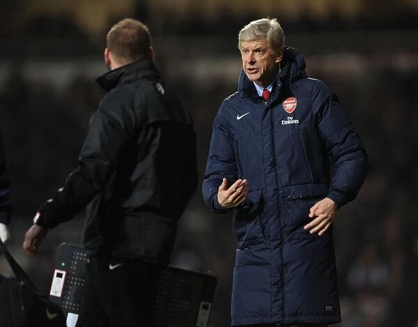 Arsene Wenger Leads Arsenal Against West Ham United in Premier League Clash (December 2013)