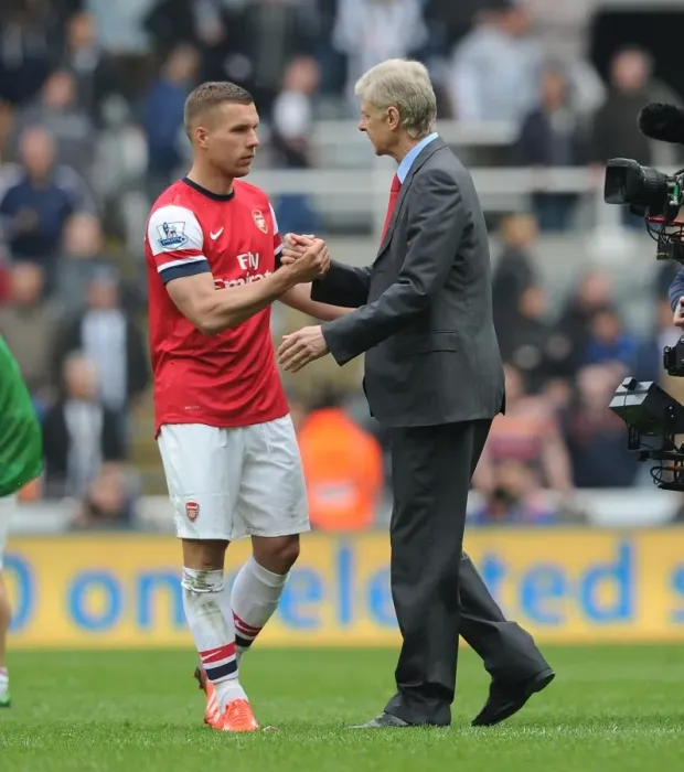 Framed Print : Arsene Wenger and Lukas Podolski Celebrate Arsenal's Win at Newcastle United (2012-13)