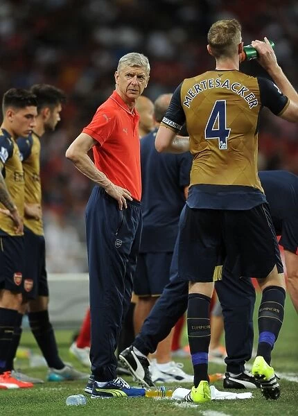 Arsene Wenger and Per Mertesacker Lead Arsenal Against Singapore XI in Barclays Asia Trophy
