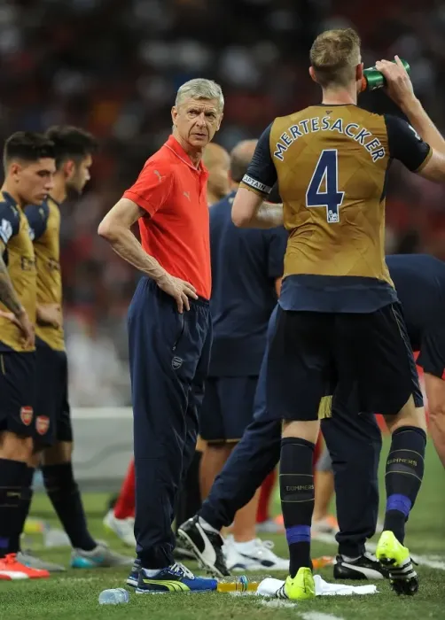 Framed Print : Arsene Wenger and Per Mertesacker Lead Arsenal Against Singapore XI in Barclays Asia Trophy Framed Print : Arsene Wenger and Per Mertesacker Lead Arsenal Against Singapore XI in Barclays Asia Trophy
