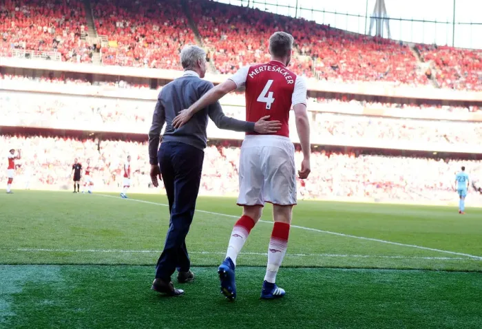 Framed Print : Arsene Wenger and Per Mertesacker: A Moment of Reflection during Arsenal vs. Burnley (2017-18) Framed Print : Arsene Wenger and Per Mertesacker: A Moment of Reflection during Arsenal vs. Burnley (2017-18)