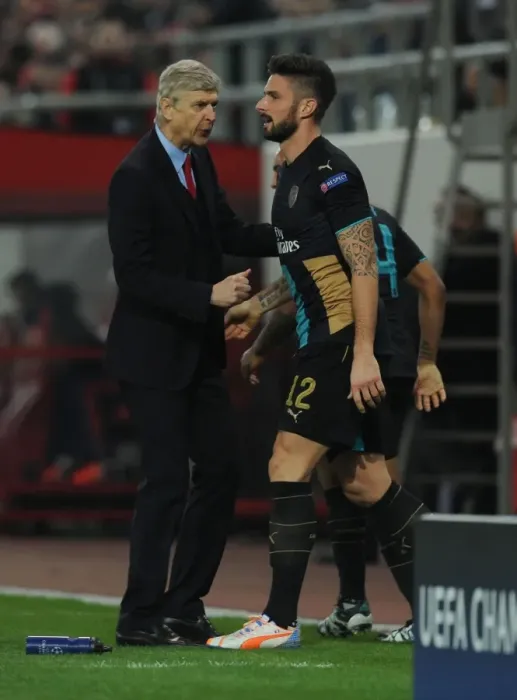 Framed Print : Arsene Wenger and Olivier Giroud: Celebrating Arsenal's Goal Against Olympiacos in the UEFA Champions League