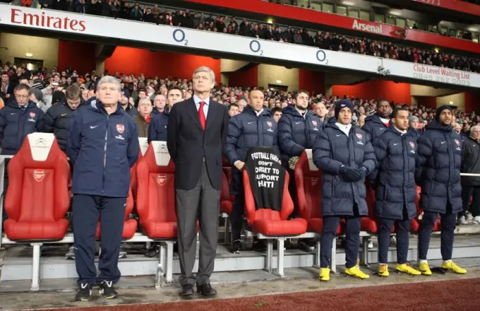 Framed Print : Arsene Wenger and Pat Rice Lead Silence for Haiti Disaster at Arsenal's Emirates Stadium Amidst 4:2 Victory over Bolton Wanderers, Barclays Premier League (2010)