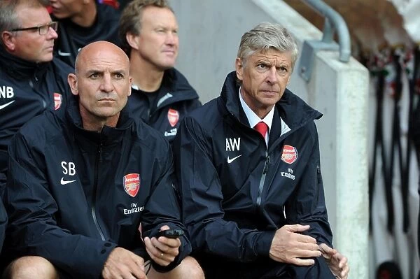 Arsene Wenger and Steve Bould at the 2012-13 Arsenal Pre-Season Match against Southampton
