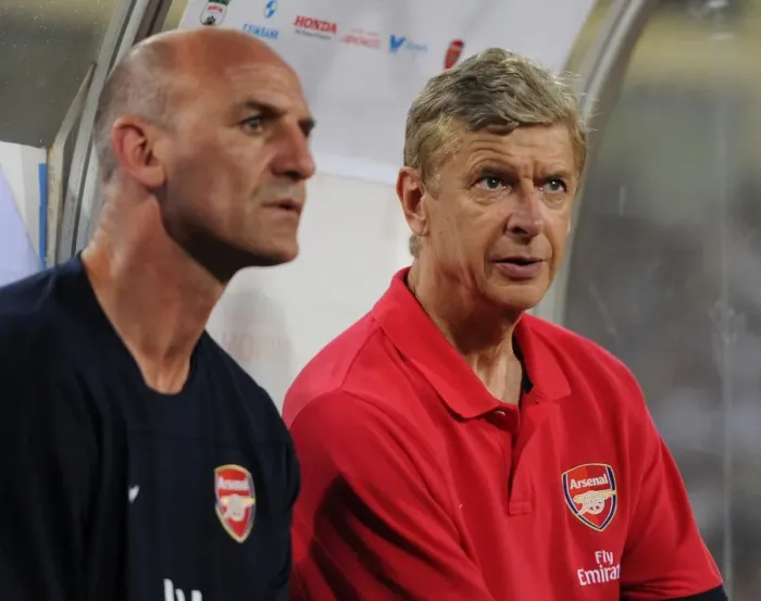 Framed Print : Arsene Wenger and Steve Bould: Preparing for Arsenal's Vietnam Friendly (2013)