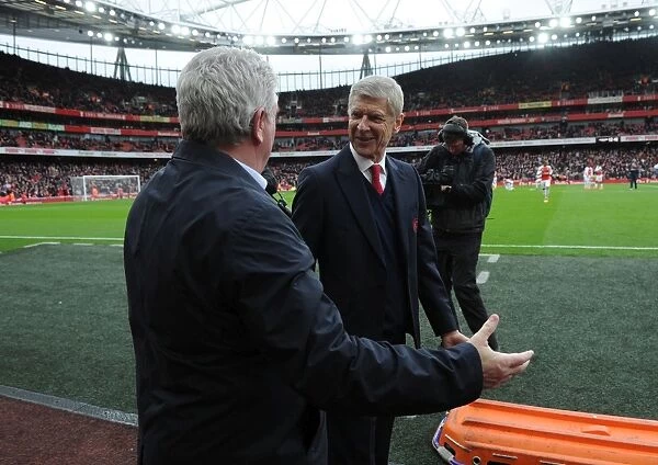 Arsene Wenger and Steve Bruce: A Pre-Match Handshake at the Emirates FA Cup Fifth Round (Arsenal vs. Hull City - 2015-16)