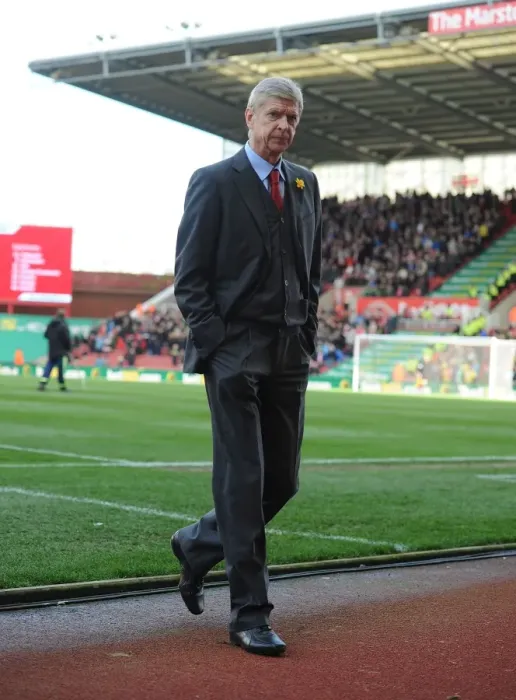 Framed Print : Arsene Wenger: Unwavering Determination Before Stoke City Match (2014) Framed Print : Arsene Wenger: Unwavering Determination Before Stoke City Match (2014)