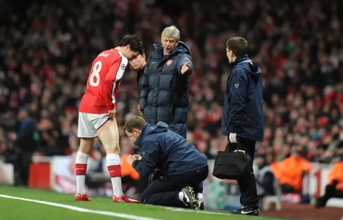 Framed Print : Arsene Wenger Watching Over Injured Samir Nasri during Arsenal's 5-0 Victory over FC Porto Framed Print : Arsene Wenger Watching Over Injured Samir Nasri during Arsenal's 5-0 Victory over FC Porto