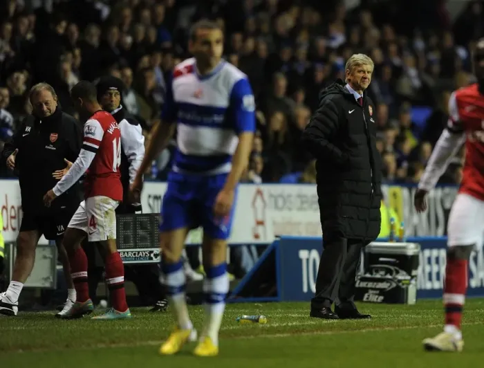 Framed Print : Arsene Wenger Watching Theo Walcott's Exit: Reading vs Arsenal (2012-13) Framed Print : Arsene Wenger Watching Theo Walcott's Exit: Reading vs Arsenal (2012-13)