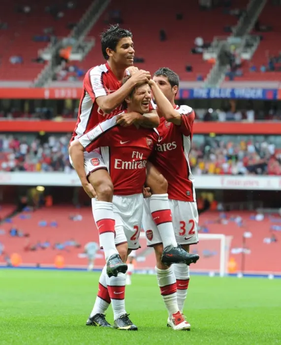 Framed Print : Arsene Wenger's Men: Arshavin, Eduardo, and Merida Celebrate Arsenal's First Goal Against Athletico Madrid, Emirates Cup 2009 Framed Print : Arsene Wenger's Men: Arshavin, Eduardo, and Merida Celebrate Arsenal's First Goal Against Athletico Madrid, Emirates Cup 2009