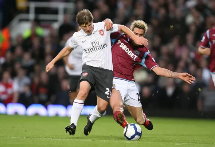 Framed Print : Arsene's Clash: Arshavin vs. Behrami - 1:1 Stalemate at Upton Park, 2009 Framed Print : Arsene's Clash: Arshavin vs. Behrami - 1:1 Stalemate at Upton Park, 2009