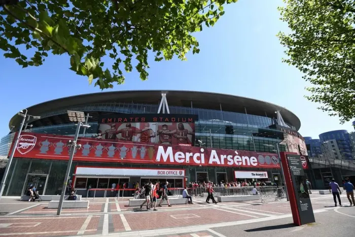 Framed Print : Arsene's Legacy: Emirates Stadium Banner Ahead of Arsenal vs Burnley