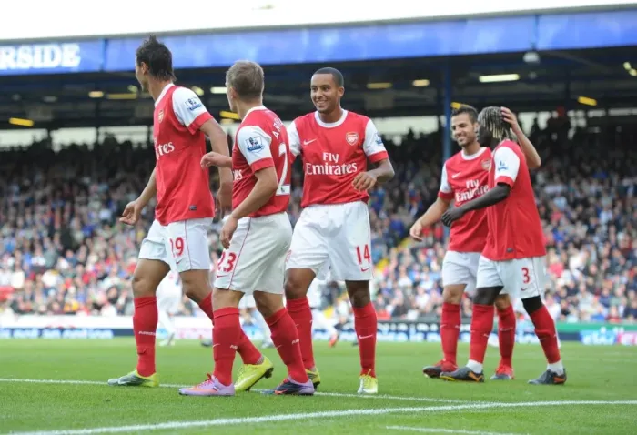 Framed Print : Arshavin, Chamakh, and Walcott: Celebrating Arsenal's 2-1 Win Over Blackburn Rovers
