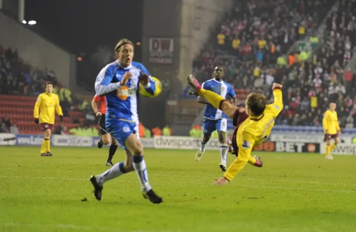 Framed Print : Arshavin Stuns Wigan: First Arsenal Goal with Brilliant Shot Past Ronnie Stam Framed Print : Arshavin Stuns Wigan: First Arsenal Goal with Brilliant Shot Past Ronnie Stam