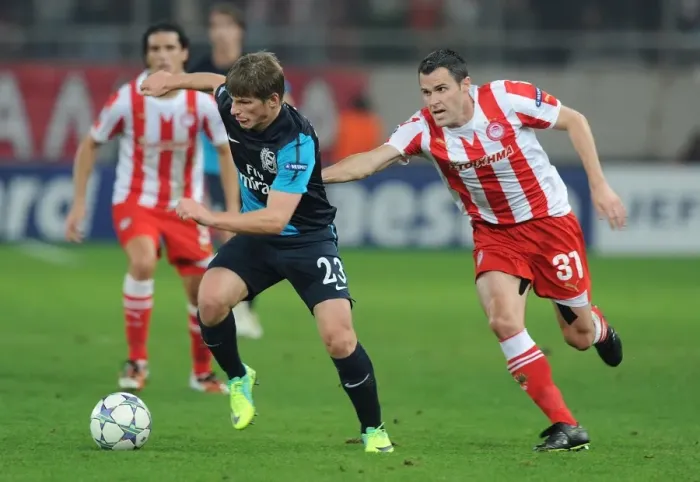 Framed Print : Arshavin vs. Orbaiz: A Champions League Showdown at Georgios Karaiskakis Stadium - Arsenal's Andrey Arshavin Outmaneuvers Pablo Orbaiz of Olympiacos (December 2011) Framed Print : Arshavin vs. Orbaiz: A Champions League Showdown at Georgios Karaiskakis Stadium - Arsenal's Andrey Arshavin Outmaneuvers Pablo Orbaiz of Olympiacos (December 2011)