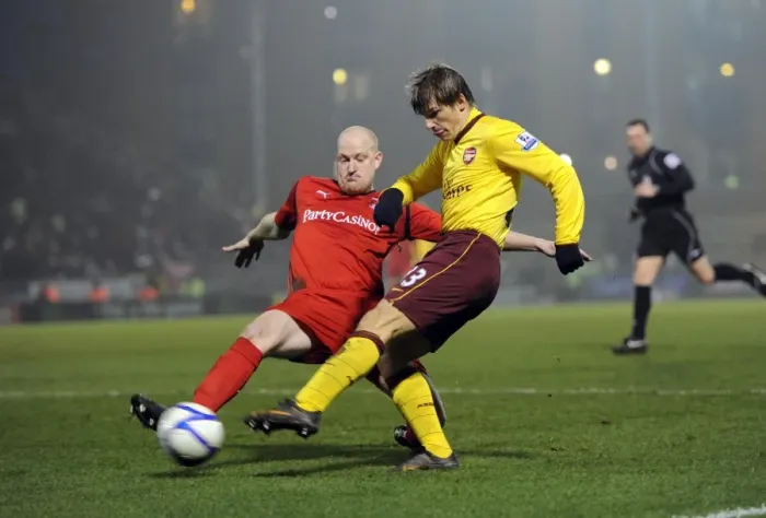 Framed Print : Arshavin vs. Whing: FA Cup Battle at Leyton Orient - Arsenal vs. Leyton Orient 1:1