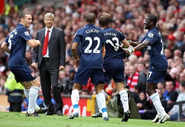 Arshavin's Strike: Arsenal's Triumph Over Manchester United in the Premier League (2009) - Arshavin, Clichy, Eboue, Vermaelen, Wenger Celebrate