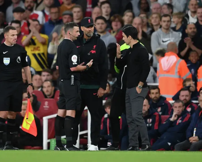 Framed Print : Arteta vs. Klopp: Intense Face-Off with Referee Oliver in Arsenal vs. Liverpool Premier League Clash Framed Print : Arteta vs. Klopp: Intense Face-Off with Referee Oliver in Arsenal vs. Liverpool Premier League Clash