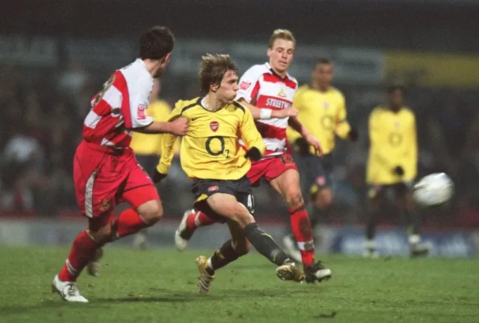 Framed Print : Arturo Lupoli (Arsenal) Ricky Ravenhill (Doncaster)