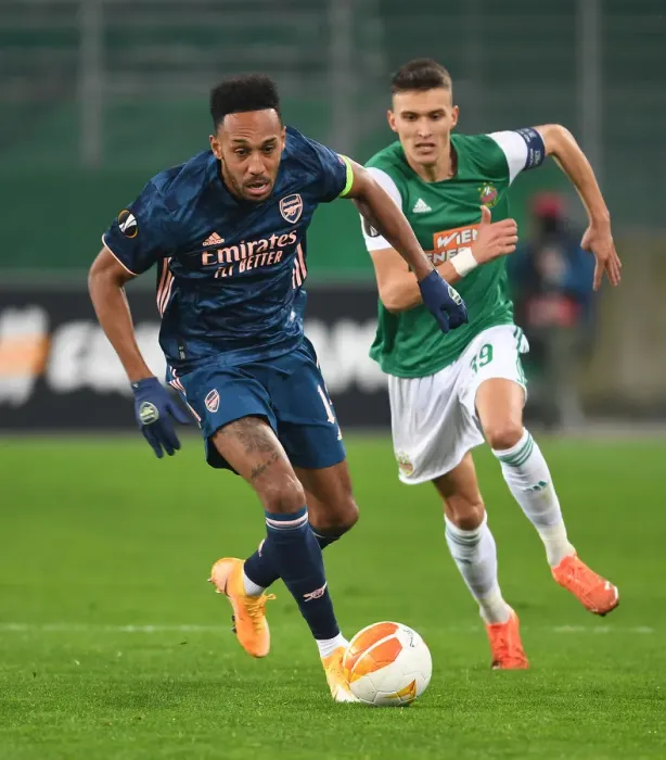 Framed Print : Aubameyang Breaks Past Rapid Wien: Arsenal's Europa League Victory
