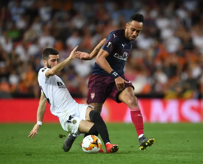 Framed Print : Aubameyang Breaks Past Valencia's Gaya in Europa League Semi-Final Showdown
