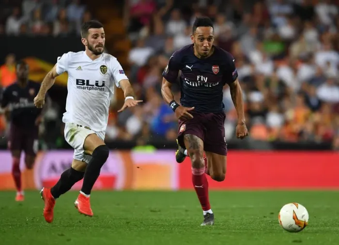 Framed Print : Aubameyang Breaks Past Valencia's Gaya in UEFA Europa League Semi-Final Showdown Framed Print : Aubameyang Breaks Past Valencia's Gaya in UEFA Europa League Semi-Final Showdown