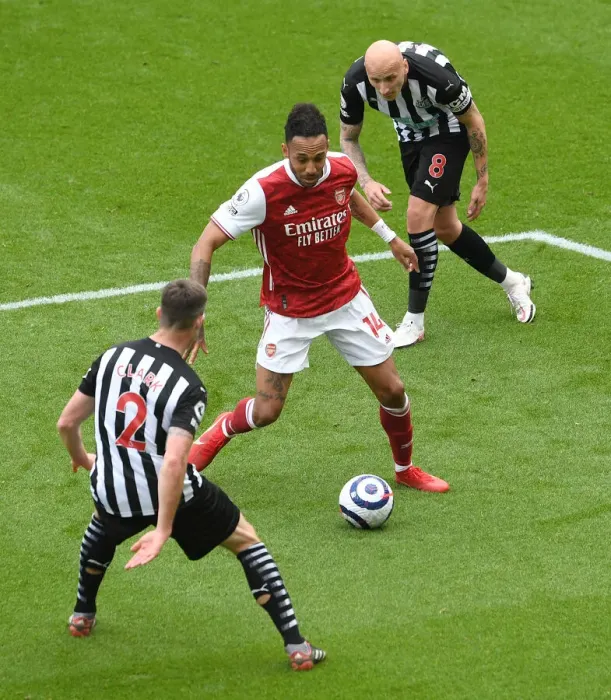 Framed Print : Aubameyang Faces Newcastle Duo in Empty St. James Park: Arsenal vs Newcastle United, Premier League 2020-21 Framed Print : Aubameyang Faces Newcastle Duo in Empty St. James Park: Arsenal vs Newcastle United, Premier League 2020-21