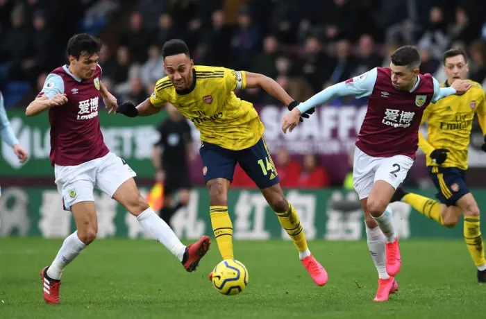 Framed Print : Aubameyang Faces Off Against Burnley: Intense Moment from Arsenal's Premier League Clash