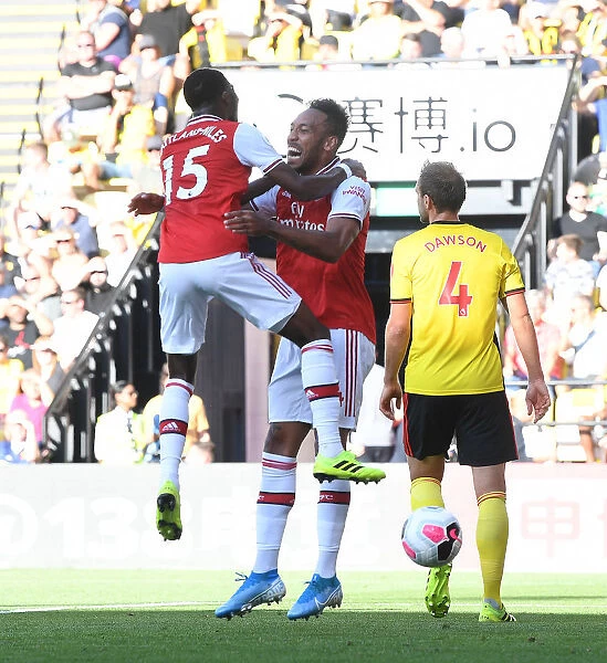 Aubameyang and Maitland-Niles Celebrate Arsenal's Win Against Watford (2019-20)