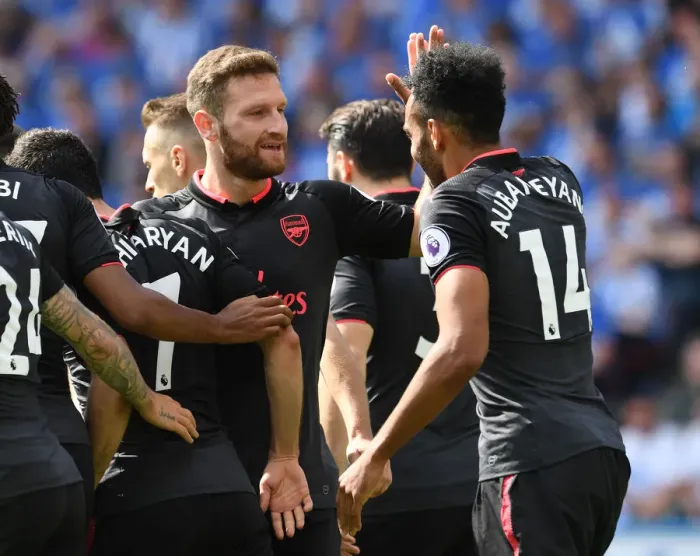 Framed Print : Aubameyang and Mustafi Celebrate Arsenal's Goal Against Huddersfield Town