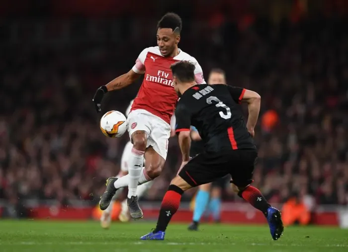 Framed Print : Aubameyang Outmaneuvers Da Silva: Arsenal vs Stade Rennais, UEFA Europa League Showdown Framed Print : Aubameyang Outmaneuvers Da Silva: Arsenal vs Stade Rennais, UEFA Europa League Showdown