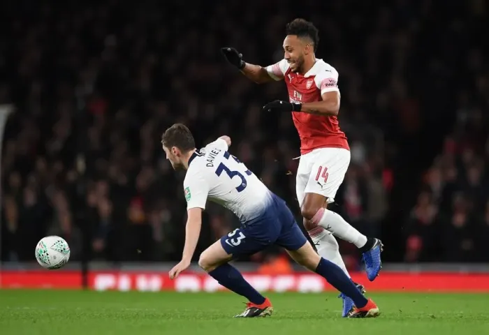 Framed Print : Aubameyang Outmaneuvers Davies in Carabao Cup Quarterfinal Clash