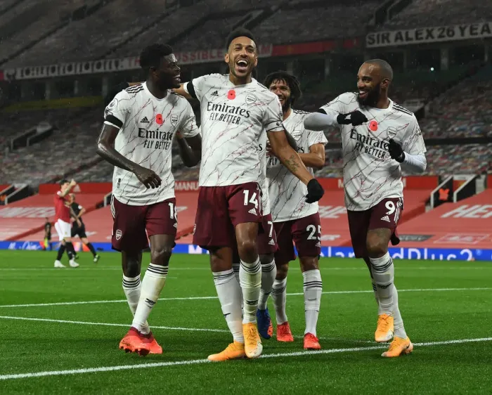 Framed Print : Aubameyang, Partey, and Lacazette: Arsenal's Goal Celebration at Old Trafford (Manchester United vs Arsenal, 2020-21) Framed Print : Aubameyang, Partey, and Lacazette: Arsenal's Goal Celebration at Old Trafford (Manchester United vs Arsenal, 2020-21)