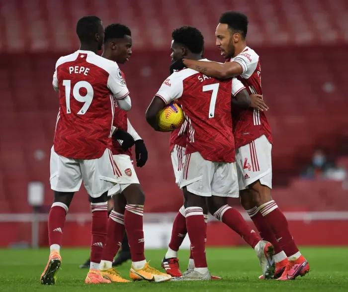 Framed Print : Aubameyang and Saka Celebrate Arsenal's Goal: Arsenal v Southampton, 2020-21 Premier League