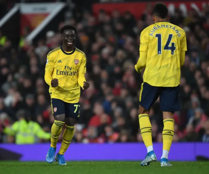 Framed Print : Aubameyang and Saka's Goal Celebration: Manchester United vs. Arsenal (2019-20)