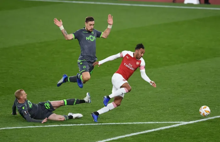Framed Print : Aubameyang Tripped by Mathieu in Arsenal vs. Sporting Europa League Match Framed Print : Aubameyang Tripped by Mathieu in Arsenal vs. Sporting Europa League Match