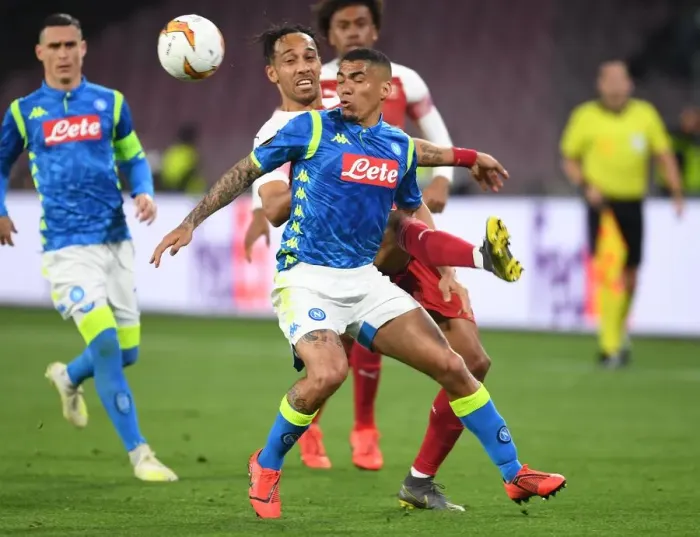 Framed Print : Aubameyang vs. Allan: Intense Rivalry in Arsenal's Europa League Showdown with Napoli