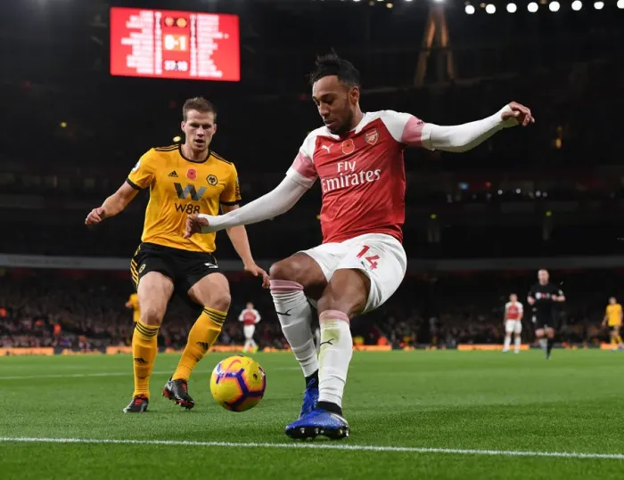 Framed Print : Aubameyang vs Bennett: Arsenal vs Wolverhampton Wanderers, Premier League Showdown