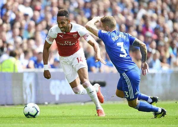 Aubameyang vs Bennett: A Tense Battle between Arsenal's Star Striker and Cardiff Defender (2018-19)