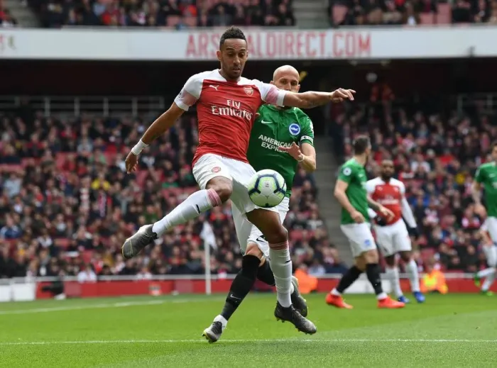 Framed Print : Aubameyang vs Bruno: Intense Clash Between Arsenal and Brighton in Premier League