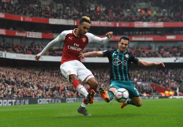 Framed Print : Aubameyang vs. Cedric: Intense Battle at Emirates Stadium - Arsenal vs. Southampton, Premier League