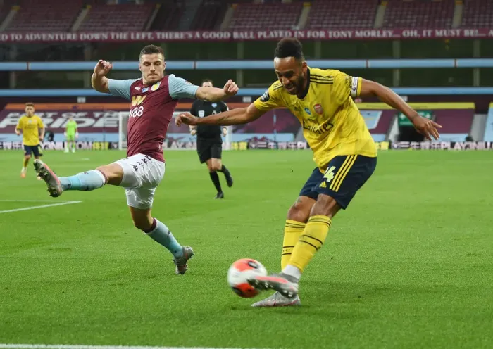 Framed Print : Aubameyang vs. Guilbert: Clash of the Wings in Aston Villa vs. Arsenal FC