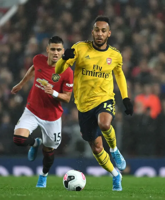 Framed Print : Aubameyang vs Manchester United: Premier League Showdown - Clash of Titans