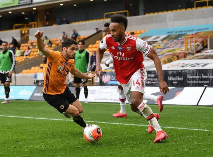 Framed Print : Aubameyang vs Neto: Intense Battle in Wolverhampton Wanderers vs Arsenal FC Premier League Clash