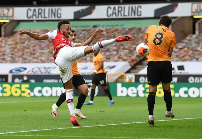 Framed Print : Aubameyang vs. Neves: Intense Moment at Wolverhampton- Arsenal FC in Premier League (2019-20) Framed Print : Aubameyang vs. Neves: Intense Moment at Wolverhampton- Arsenal FC in Premier League (2019-20)