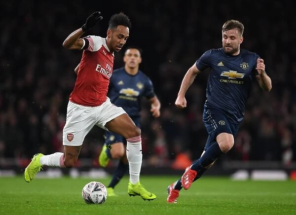 Aubameyang vs Shaw: Titanic Clash in Arsenal's FA Cup Battle against Manchester United