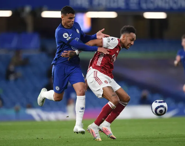 Framed Print : Aubameyang vs. Thiago Silva: A Premier League Battle at Empty Stamford Bridge, 2021